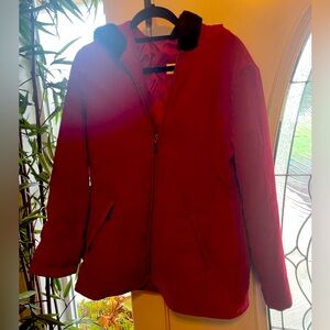 Extremely warm, brilliant red coat with faux fur hood.. Size medium.